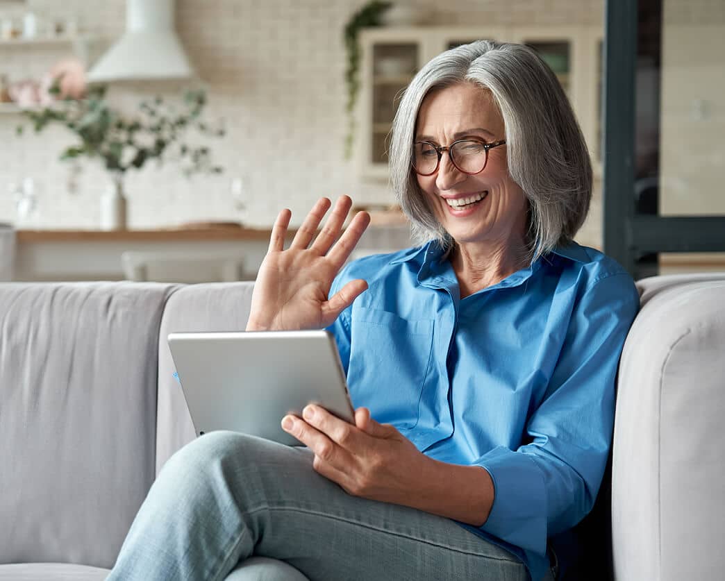 Elderly woman on tablet