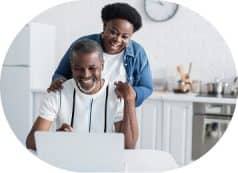 People looking at computer